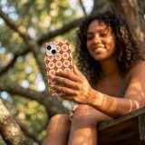 Bubblegum Pink Retro Tiles iPhone 15 Case - Lifestyle photo showing phone case in use