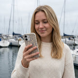 London Fog Rise and Shine iPhone 15 Case - Lifestyle photo showing phone case in use
