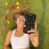 Black Galactic Glow Google Pixel 8a Case - Lifestyle photo showing phone case in use