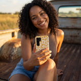 Honey Funky Petals Samsung Galaxy S25 Case - Lifestyle photo showing phone case in use