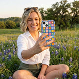 Electric Blue Petal Pop iPhone 14 Case - Lifestyle photo showing phone case in use