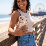 Seashell Aqua Dreams iPhone 15 Case - Lifestyle photo showing phone case in use