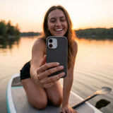 Black iPhone 16 Pro Max Case - Lifestyle photo showing phone case in use