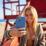 Electric Blue iPhone 16 Pro Max Case - Lifestyle photo showing phone case in use