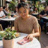 Bubblegum Pink iPhone 16 Pro Max Case - Lifestyle photo showing phone case in use