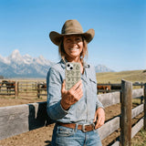 London Fog Lets Play Ball iPhone 15 Case - Lifestyle photo showing phone case in use