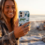 Powder Blue Tropical Rainforest iPhone 15 Case - Lifestyle photo showing phone case in use