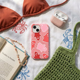 Bubblegum Pink Phantom Pals iPhone 15 Case - Lifestyle photo showing phone case in use