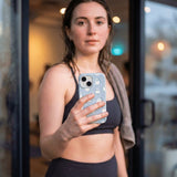 Powder Blue Ghostly iPhone 16 Pro Case - Lifestyle photo showing phone case in use