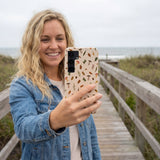 Seashell Woodland Harvest Samsung Galaxy S25 Case - Lifestyle photo showing phone case in use