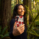 Seashell Scary Cherry Samsung Galaxy S25 Case - Lifestyle photo showing phone case in use