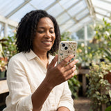 London Fog Invertebrates iPhone 14 Case - Lifestyle photo showing phone case in use