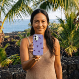 Lavender Grape Juice iPhone 15 Pro Case - Lifestyle photo showing phone case in use