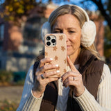 Seashell Gingerbread delight iPhone 14 Case - Lifestyle photo showing phone case in use