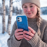 Electric Blue Backcountry Ski iPhone 16 Case - Lifestyle photo showing phone case in use