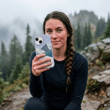 Powder Blue Shredding Peaks iPhone 14 Case - Lifestyle photo showing phone case in use
