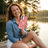 Bubblegum Pink Dicey Cherries iPhone 15 Pro Case - Lifestyle photo showing phone case in use