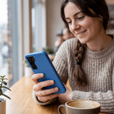 Electric Blue Samsung S25 Phone Case - Lifestyle photo showing phone case in use