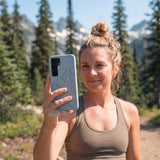 Powder Blue Rockies Samsung Galaxy S25 Case - Lifestyle photo showing phone case in use