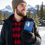 Electric Blue Hockey Postage iPhone 15 Pro Case - Lifestyle photo showing phone case in use