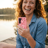 Bubblegum Pink Dicey Cherries Samsung Galaxy S25 Case - Lifestyle photo showing phone case in use