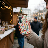 Seashell Holiday Lights Samsung Galaxy S25 Case - Lifestyle photo showing phone case in use