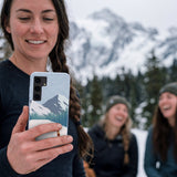 Powder Blue Shredding Peaks Samsung Galaxy S25 Case - Lifestyle photo showing phone case in use