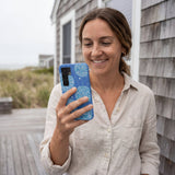 Electric Blue Blue Groove Samsung Galaxy S25 Case - Lifestyle photo showing phone case in use