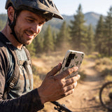 London Fog Bike Trek MTBCO Samsung Galaxy S25 Case - Lifestyle photo showing phone case in use