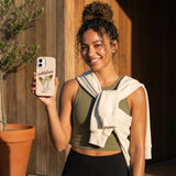 Seashell Pickletinis iPhone 15 Case - Lifestyle photo showing phone case in use