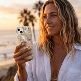 London Fog Sea Gems iPhone 14 Case - Lifestyle photo showing phone case in use