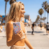 Powder Blue Mermaid Finds iPhone 16 Pro Case - Lifestyle photo showing phone case in use
