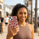 Seashell Flower Stack iPhone 14 Case - Lifestyle photo showing phone case in use