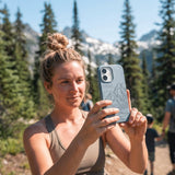 Powder Blue Rockies iPhone 17 Pro Case - Lifestyle photo showing phone case in use