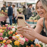 Seashell Little Yellow Flowers Google Pixel 10/10 Pro Case - Lifestyle photo showing phone case in use
