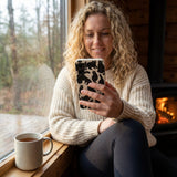 London Fog Night Meowers Samsung Galaxy S25 Case - Lifestyle photo showing phone case in use