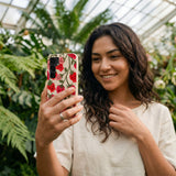 Seashell Strawboories Samsung Galaxy S25 Case - Lifestyle photo showing phone case in use