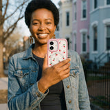 Clear Little Cherries iPhone 17 Pro Case With Petal Pink Ridge (MagSafe included) - Lifestyle photo showing phone case in use