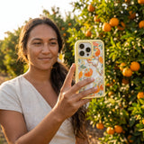 Clear Citrus Blooms iPhone 17 Case With Sunbeam Ridge (MagSafe included) - 8465009967192_lifestyle_1773791678963_v0.jpg