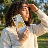 Clear Lemon Drop iPhone 17 Case With Sunbeam Ridge (MagSafe included) - Lifestyle photo showing phone case in use