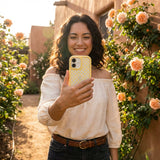 Clear Sunny Spots iPhone 17 Pro Case With Sunbeam Ridge (MagSafe included) - Lifestyle photo showing phone case in use