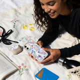 Clear Twilight Pearl iPhone 17 Case With London Fog Ridge (MagSafe included) - Lifestyle photo showing phone case in use