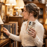 Clear Mocha Poppy iPhone 17 Case With London Fog Ridge (MagSafe included) - Lifestyle photo showing phone case in use