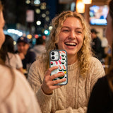 Clear Sushi Night iPhone 17 Case With Noir Ridge (MagSafe included) - Lifestyle photo showing phone case in use