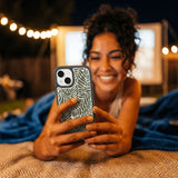 Clear Fern Dreams iPhone 17 Case With Noir Ridge (MagSafe included) - Lifestyle photo showing phone case in use