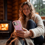 Clear Pink Blooms iPhone 17 Case With Petal Pink Ridge (MagSafe included) - Lifestyle photo showing phone case in use