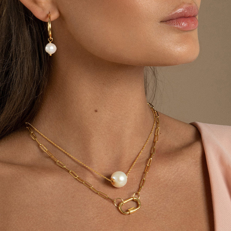 The Daphne Gold Paperclip Link Chain necklace is our most versatile handmade chain necklace. Unscrew the carabiner closure to double it, create a Y style necklace, or a wrap bracelet. Link two of them together for a funky triple chain look.