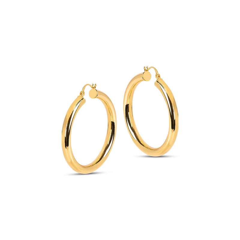 An upgrade on a classic silhouette, the Lola Extra Large Hoops are the boldest tunnel hoops in our collection. Light weight and handcrafted with sustainable materials, they are a must have for an instant statement ear.