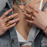 Our Nudo collection is a representation of the modern jewellery that is a second skin to every woman. This size adjustable sustainable gold ring is hand-sculpted to define your daily look with an organic embossed surface. 