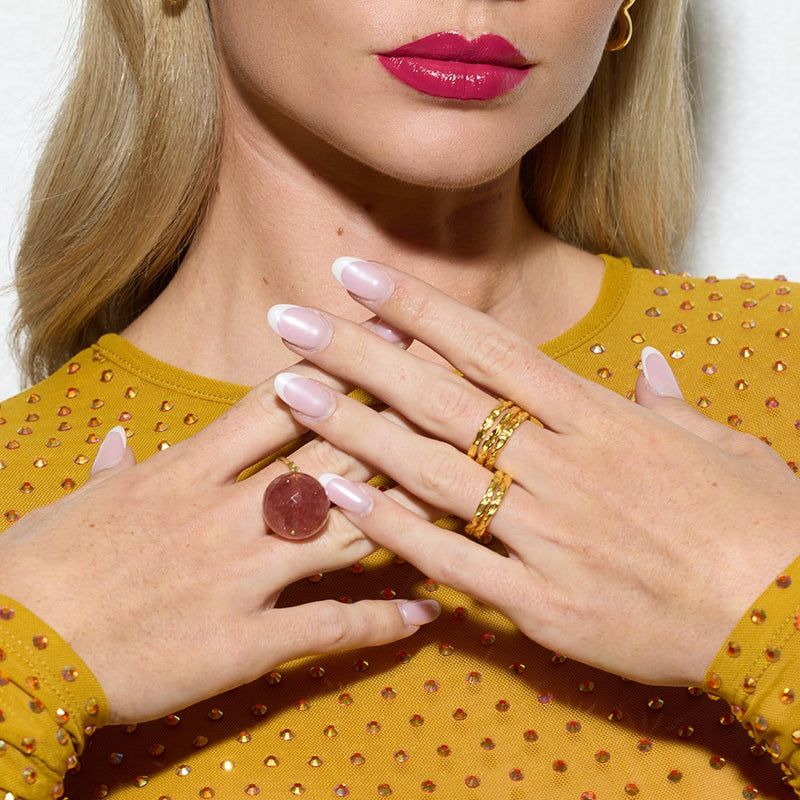 Petra Gold Stacking Ring is fully adjustable and is hand finished with a stone like texture. Wear it stacked together in multiples or mix with our other Amadeus stacking ring combinations.